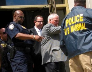 Jared Fogle (C) is led from federal court in Indianapolis, Indiana August 19, 2015.   REUTERS/Susan Guyett